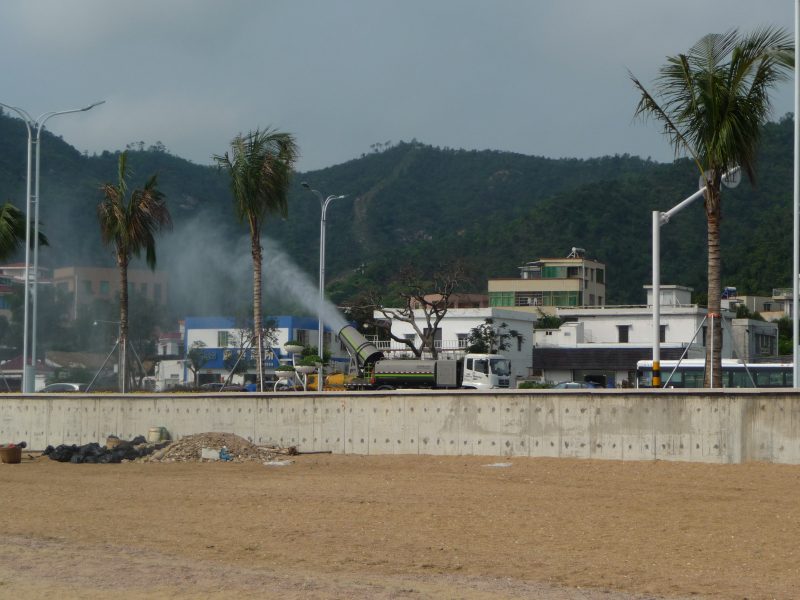 Controlling air pollution by the mist cannon. China