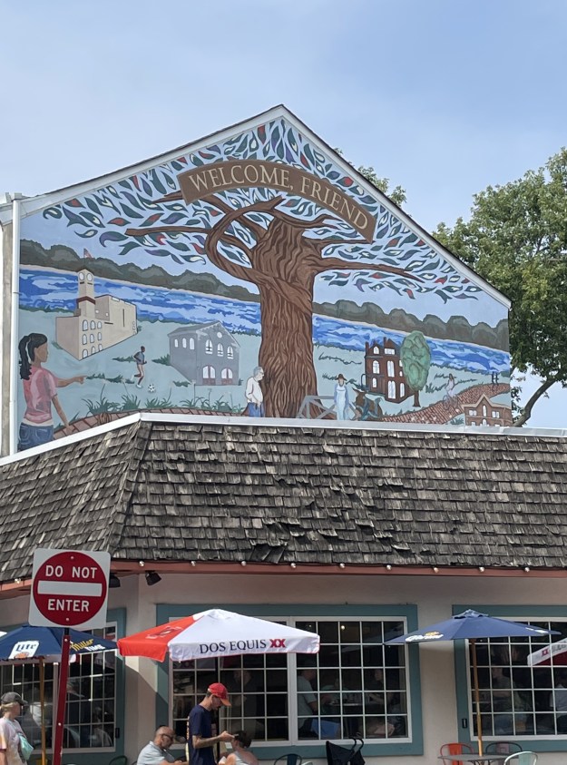 'Welcome Friend' painting on a wall in Bristol, PA.