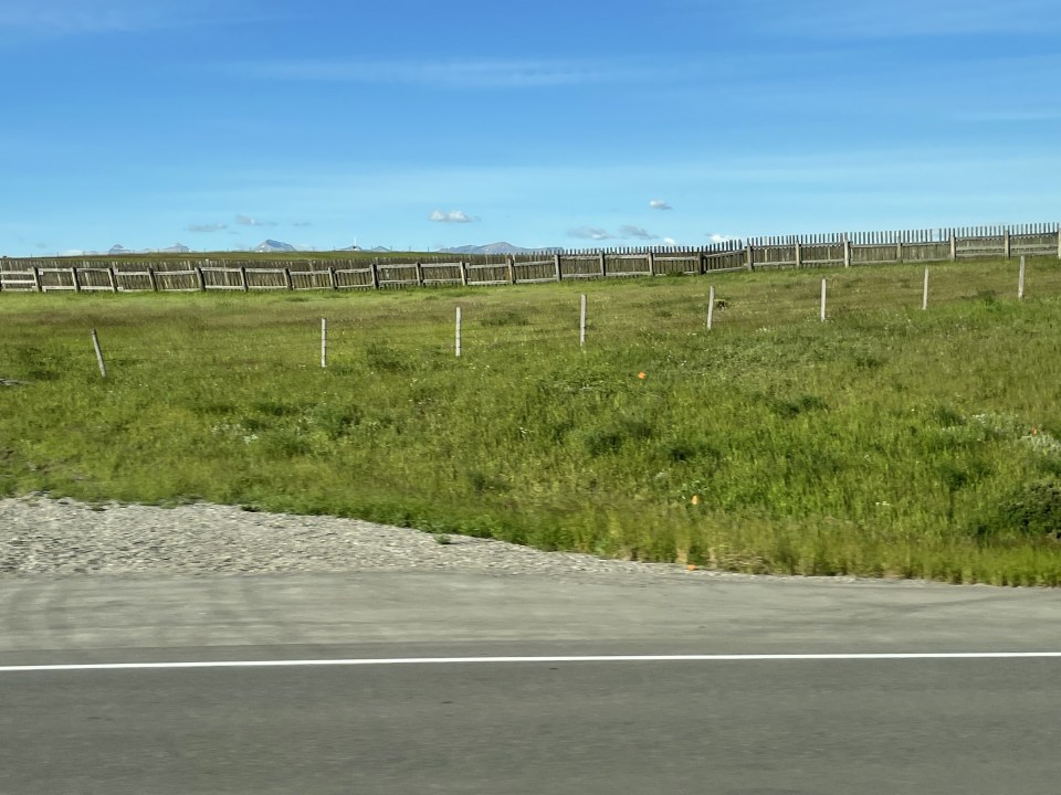 Snow barriers to prevent ice and snow from drifting onto the road.