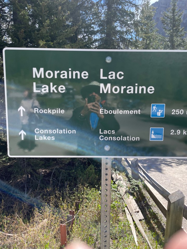 Road sign for Lake Moraine and the Rockpile.